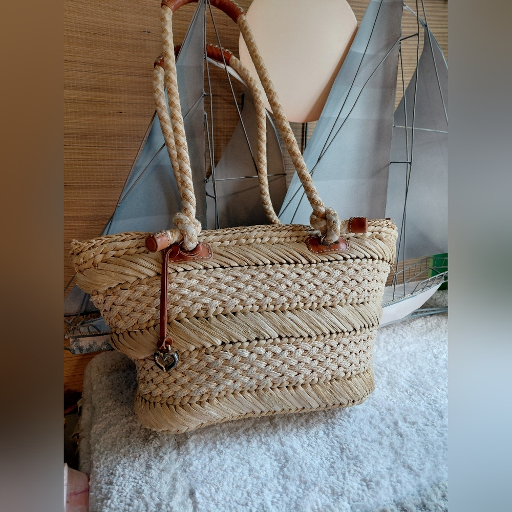 Brighton Nautical beige woven straw tote bag features brown leather trim